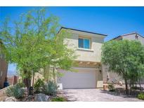 Charming home featuring desert landscaping, a two-car garage, and neutral stucco exterior at 4652 Wyncrest Ave, Las Vegas, NV 89115