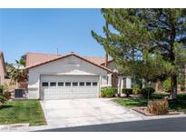Charming single-story home featuring a two-car garage and mature landscaping at 4904 Wiltondale Way, Las Vegas, NV 89130