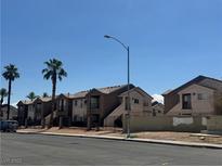 Exterior shot of apartment building with desert landscaping and architectural design at 1505 Frank Aved St # 101, Las Vegas, NV 89110