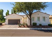 Inviting single-story home featuring a well-maintained front yard and charming desert landscaping at 5747 Jaborandi Ave, Pahrump, NV 89061