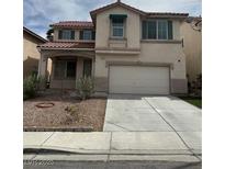 Charming two-story home with a spacious two car garage and low maintenance front yard at 8215 Shell Beach Ct, Las Vegas, NV 89117