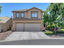 Charming two-story home featuring a three-car garage, desert landscaping, and a welcoming facade at 8333 Valley Stream Ave, Las Vegas, NV 89131