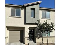 Charming two-story home with a modern architectural design and well-maintained front yard at 12170 Midnight Pine Rd # 3, Las Vegas, NV 89183