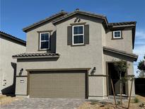 Charming two-story home featuring a well-maintained front yard, and a two car garage at 5175 Capucina St # Lot 5, Las Vegas, NV 89122
