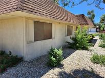 Charming single-story home featuring a gravel yard and desert-friendly landscaping at 2773 Heritage Ct, Las Vegas, NV 89121