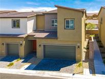 Charming townhome with a two-car garage and neutral color scheme at 4229 Venus Falls Ave, North Las Vegas, NV 89084