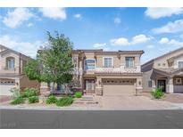 Charming two-story home featuring well-manicured landscaping and a brick driveway at 6739 Quapaw St, Las Vegas, NV 89149