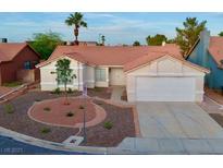 Charming one-story home with desert landscaping and attached two car garage at 8010 Coffee Tree Ct, Las Vegas, NV 89123