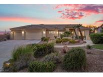 Beautiful single-story home featuring a three-car garage and well-maintained landscaping at 835 Market Crest Dr, Las Vegas, NV 89110
