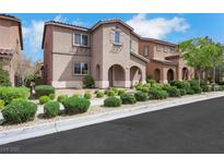 Charming stucco home featuring manicured landscaping and a welcoming front entrance at 1976 Galleria Spada St, Henderson, NV 89044