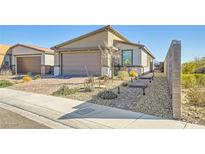Charming home featuring a brick driveway, two-car garage, and desert landscaping at 9698 Pacific Pine St, Las Vegas, NV 89143