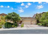 Charming two-story home with a three-car garage and a well-manicured front yard at 1134 Pandora Canyon St, Henderson, NV 89052
