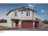 Charming two-story home features a tile roof, three car garage, and stone accents at 1209 Dre Harbor Pl # 82, North Las Vegas, NV 89084