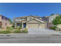 Charming two-story home featuring a three-car garage, neutral paint scheme and well-manicured landscaping at 3632 Red Fir St, Las Vegas, NV 89135
