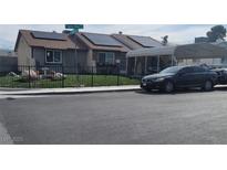 Charming single-story home featuring solar panels and a well-maintained front yard with secure car port at 6231 Santa Maria Ave, Las Vegas, NV 89108