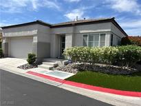 Charming single-story home with a well-maintained front yard and attached garage at 10532 Redwood Ash Ave, Las Vegas, NV 89144
