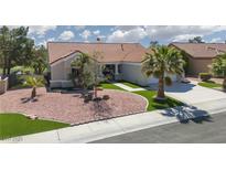 Charming single-story home with well-maintained landscaping, desert rock, and palm trees at 2816 Golfside Dr, Las Vegas, NV 89134