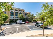 Exterior of building featuring architectural details and parking area at 29 Montelago Blvd # 209, Henderson, NV 89011