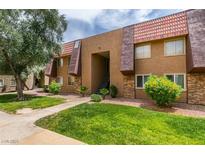 Two-story apartment complex with mature landscaping at 5240 Indian River Dr # 273, Las Vegas, NV 89103