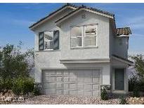 Charming two-story home features a two-car garage and stylish architectural details at 9082 Rivington Ave, Las Vegas, NV 89148