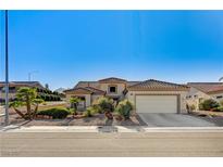 Beautiful single-story home with desert landscaping and a two-car garage at 2801 Byron Dr, Las Vegas, NV 89134