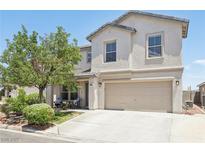 Charming two-story home featuring a well-maintained front yard and an attached two-car garage at 3966 Crystal Trip Ct, Las Vegas, NV 89129