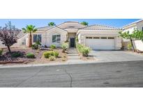 Charming single-story home with a well-manicured front yard and inviting curb appeal at 11157 Sandy Grove Ave, Las Vegas, NV 89144