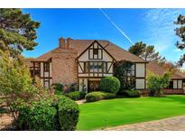 Charming two-story home features manicured lawn, brick accents, and Tudor-style details at 3141 E Katie Ave, Las Vegas, NV 89121