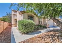 Charming single-story home with landscaped front yard and desert-friendly landscaping at 7515 Splashing Rock Dr, Las Vegas, NV 89131