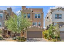 Charming two-story home with desert landscaping and a private two-car garage at 156 Campbelltown Ave, Henderson, NV 89015