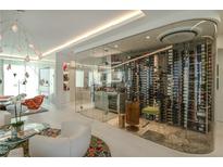 Elegant living room featuring a modern wine cellar and sophisticated decor at 3750 Las Vegas Blvd # 4303, Las Vegas, NV 89158