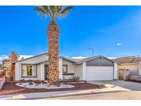 Charming single-story home features a xeriscaped yard and attached two-car garage at 6553 Baywood Ave, Las Vegas, NV 89103