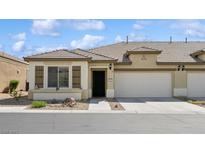 Charming single-story home featuring a two-car garage and low-maintenance landscaping at 2453 Vivid Sky Pl, Henderson, NV 89044