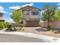 Beautiful two story home featuring a well maintained lawn and attached two car garage at 4030 Midnight Crest Ave, North Las Vegas, NV 89031