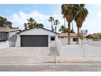 Charming single-story home featuring a well-maintained front yard, desert landscaping, and an attached two-car garage at 4312 Chrysalis Dr, Las Vegas, NV 89121