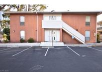 Charming two-story brick apartment complex with stairs to the second level and designated parking at 634 Oakmont Ave # 1903, Las Vegas, NV 89109