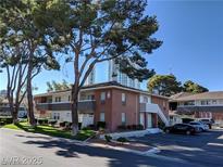 Comfortable condo complex featuring manicured lawns and ample parking at 634 Oakmont Ave # 1903, Las Vegas, NV 89109