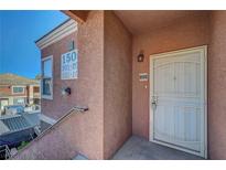 A charming apartment with a secure screen door and a freshly painted exterior, numbered 202 at 1505 Blackcombe St # 202, Las Vegas, NV 89128