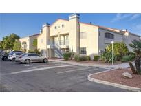 Condo with well-maintained landscaping, ample parking, and charming architectural details at 2725 S Nellis Blvd # 2049, Las Vegas, NV 89121