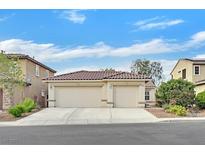 Charming home featuring a desert landscape, driveway, and a two-car garage at 4020 Recktenwall Ave, North Las Vegas, NV 89081