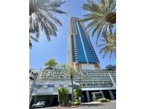 Palms Place with palm trees set against clear blue skies at 4381 W Flamingo Rd # 2022, Las Vegas, NV 89103