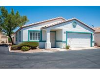 Charming single-story home featuring a two-car garage and well-maintained landscaping at 5099 Mascaro Dr, Las Vegas, NV 89122
