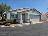 Charming single-story home with a well-maintained yard and attached two-car garage at 5099 Mascaro Dr, Las Vegas, NV 89122