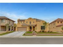 Charming two-story home with a landscaped front yard and neutral exterior paint at 5642 Breckenridge St, North Las Vegas, NV 89081