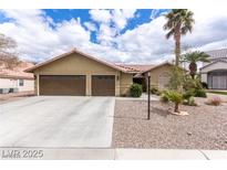 Quaint one-story home features desert landscaping and a two-car garage at 10058 Saint Augustine St, Las Vegas, NV 89183