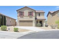 Two-story home with a beige stucco finish, red shutters, and a two-car garage in a suburban neighborhood at 5250 Chester Creek Ct, Las Vegas, NV 89141
