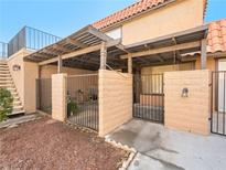 Charming townhome featuring a private patio with pergola, perfect for outdoor relaxation and entertaining at 6630 Bubbling Brook Dr # C, Las Vegas, NV 89107