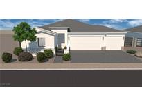 Charming single story home featuring a three car garage, modern design and beautiful landscaping at 6945 Unicorn Street, Las Vegas, NV 89131