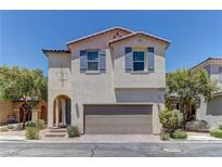 Charming two-story home featuring a spacious two-car garage and desert landscaping at 7104 Flathead River Ave, Las Vegas, NV 89179