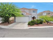 Charming two-story home features desert landscaping and a spacious two-car garage in a desirable neighborhood at 9348 Buckhaven Dr, Las Vegas, NV 89117